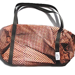 Bolsa marrón con puntos blancos