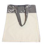 Bolsa para zafú bicolor con asas grises y flores blancas